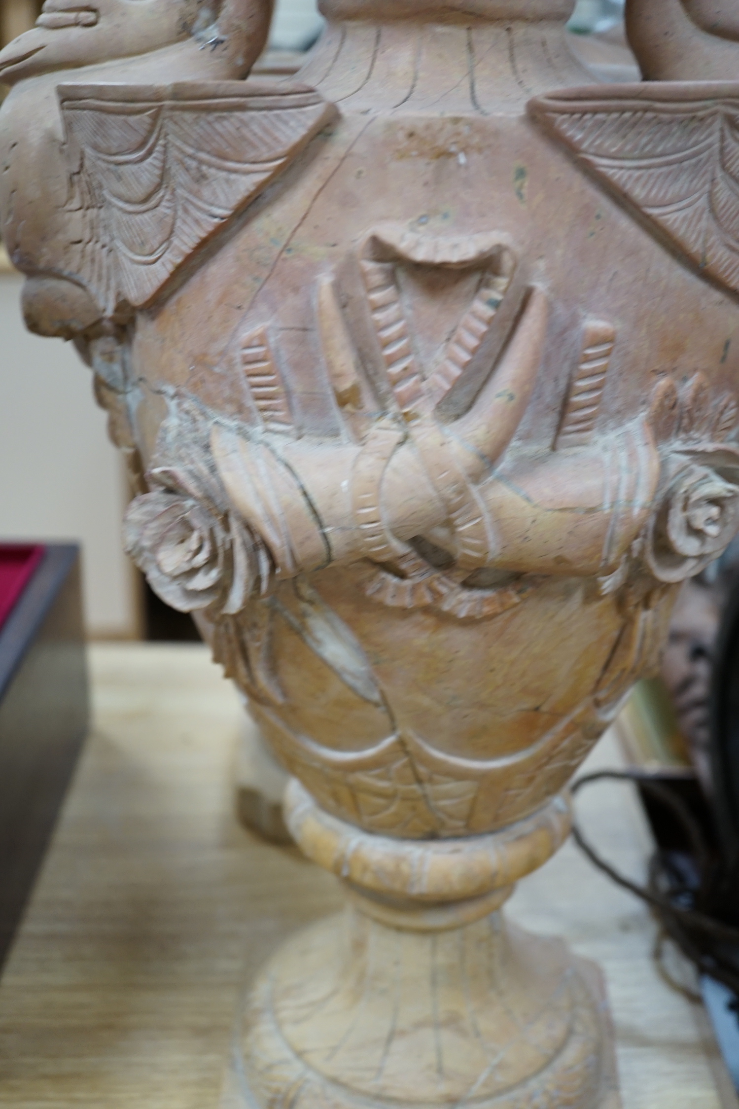 A large pair of Italian carved hardstone finial urns, 59cm